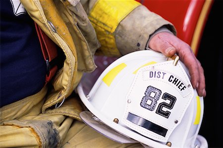 simsearch:700-00076137,k - Close-Up of Firefighter Holding Helmet Foto de stock - Direito Controlado, Número: 700-00075535