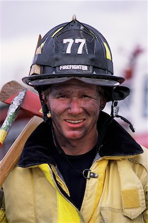 simsearch:700-00076137,k - Portrait of Male Firefighter Holding Axe Outdoors Foto de stock - Direito Controlado, Número: 700-00075542