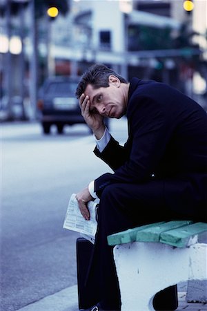 simsearch:700-00695821,k - Mature Businessman Sitting on Bench by Street, Resting Head on Hand Stock Photo - Rights-Managed, Code: 700-00075573