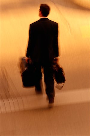 Back View of Businessman Walking Outdoors Toronto, Ontario, Canada Foto de stock - Con derechos protegidos, Código: 700-00075893