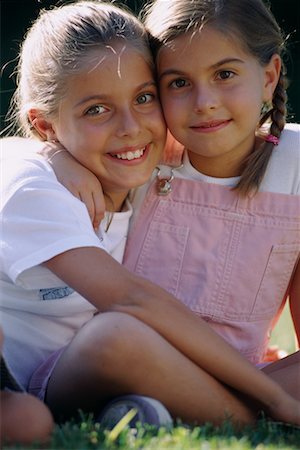 Portrait of Two Girls Sitting Outdoors Stock Photo - Rights-Managed, Code: 700-00075916