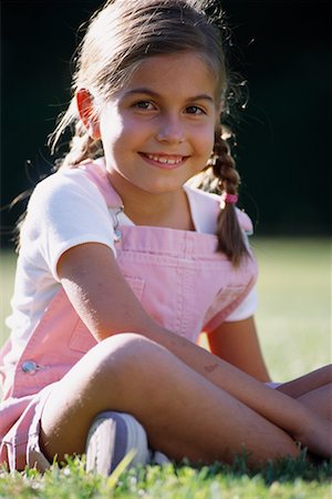 Portrait of Girl Sitting Outdoors Stock Photo - Rights-Managed, Code: 700-00075919