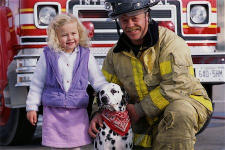 funny truck transport - Portrait of Mature Male Firefighter, Girl and Dalmatian By Fire Truck Stock Photo - Rights-Managed, Code: 700-00076175