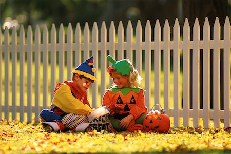 simsearch:700-00935223,k - Boy and Girl in Halloween Costumes, Sitting Outdoors with Candy Stock Photo - Rights-Managed, Code: 700-00076692