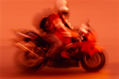 simsearch:700-00069624,k - Blurred View of Motorcyclist Toronto, Ontario, Canada Foto de stock - Con derechos protegidos, Código: 700-00076803