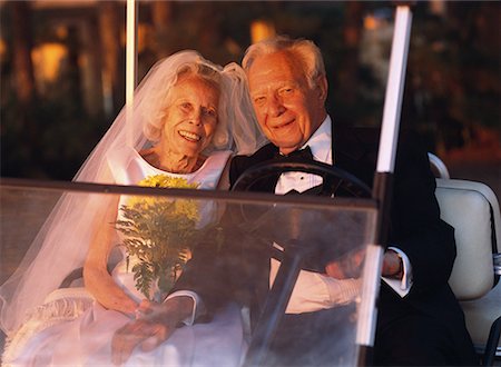 Portrait of Mature Bride and Groom in Golf Cart Stock Photo - Rights-Managed, Code: 700-00077002