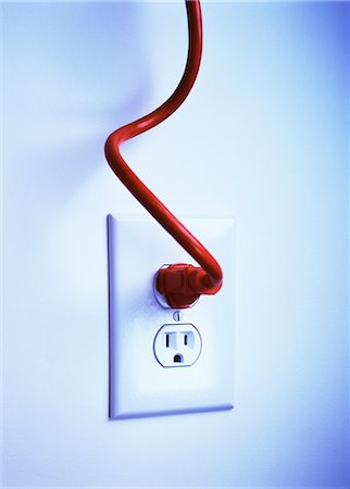 simsearch:700-00549356,k - Red Electrical Cord Plugged into Outlet Stock Photo - Rights-Managed, Code: 700-00077373