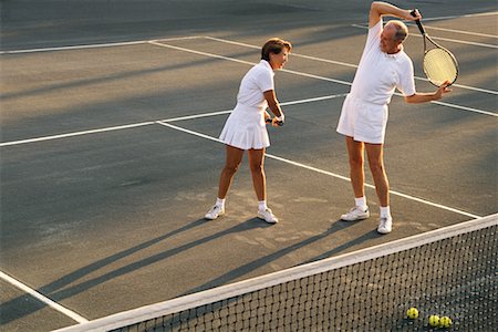 Mature Couple Playing Tennis Stock Photo - Rights-Managed, Code: 700-00077492