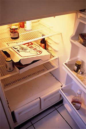 Sparsely Stocked Fridge with Pizza Box Stock Photo - Rights-Managed, Code: 700-00077839