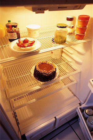 simsearch:700-00077881,k - Sparsely Stocked Fridge with Cake and Pastry Stock Photo - Rights-Managed, Code: 700-00077841