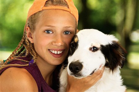 simsearch:700-00098404,k - Portrait of Girl with Dog Outdoors Fotografie stock - Rights-Managed, Codice: 700-00078112