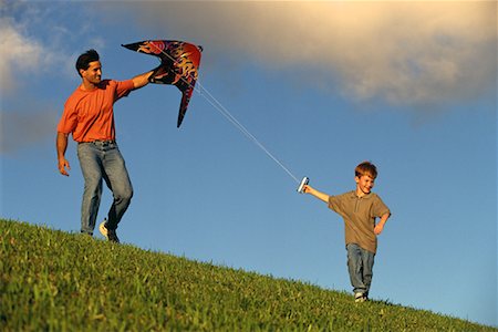 Father and Son Flying Kite Stock Photo - Rights-Managed, Code: 700-00078277