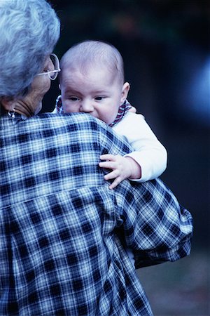 simsearch:700-00062714,k - Back View of Grandmother Holding Grandchild Outdoors Stock Photo - Rights-Managed, Code: 700-00078288