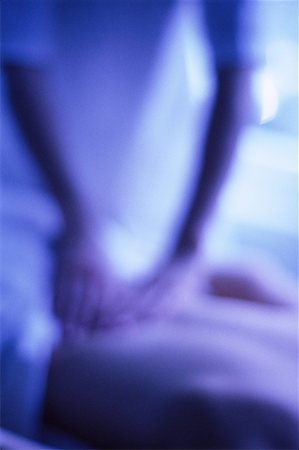 Blurred View of Person Having Massage Stock Photo - Rights-Managed, Code: 700-00078299