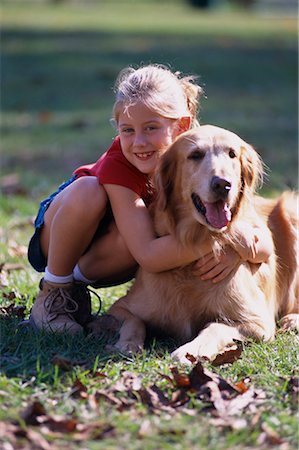 simsearch:700-00095769,k - Portrait of Girl Hugging Dog Outdoors Stock Photo - Rights-Managed, Code: 700-00078290