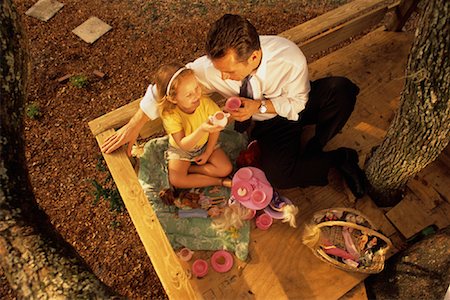family tea time - Father and Daughter Having Tea Party in Tree House Stock Photo - Rights-Managed, Code: 700-00078773