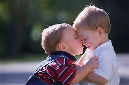 Two Boys Face to Face Outdoors Stock Photo - Rights-Managed, Code: 700-00079064