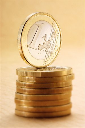 Stack of European Coins with Coin Standing on Top Stock Photo - Rights-Managed, Code: 700-00079195