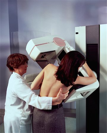 Woman Having Mammogram Foto de stock - Con derechos protegidos, Código: 700-00079385