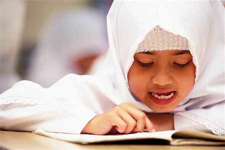 Girl Reading in Islamic Study School, Brunei Darussalam Stock Photo - Rights-Managed, Code: 700-00079586