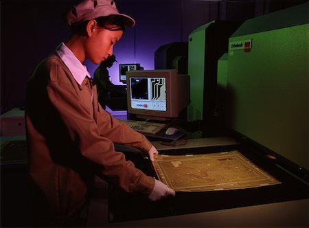 simsearch:841-03871437,k - Femme travaillant à l'assemblage de circuits imprimés Zhu Salut, Chine Photographie de stock - Rights-Managed, Code: 700-00079808