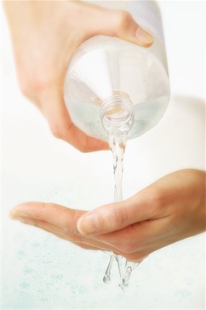 simsearch:700-00748140,k - Close-Up of Woman Pouring Liquid Soap in Hand Stock Photo - Rights-Managed, Code: 700-00079908