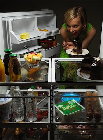simsearch:700-00077881,k - Portrait of Woman Standing at Open Fridge, Holding Chocolate Cake, Smiling Stock Photo - Rights-Managed, Code: 700-00079959