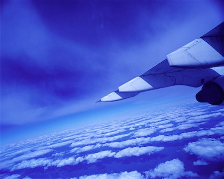 plane flying large sky blue wing - View of Clouds and Wing from Airplane Window Stock Photo - Rights-Managed, Code: 700-00070056
