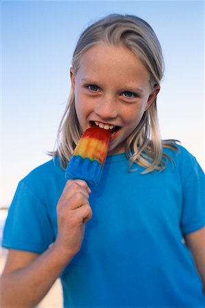 Portrait of Girl Eating Popsicle Outdoors Stock Photo - Rights-Managed, Code: 700-00070300