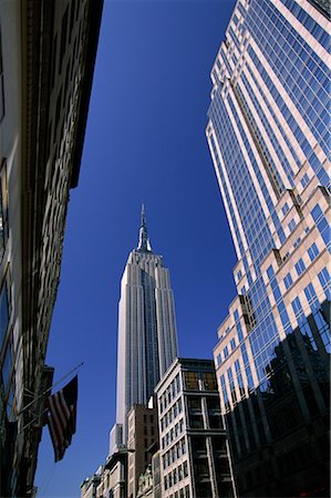 simsearch:845-03721180,k - Looking Up at Empire State Building and Office Towers New York, New York, USA Stock Photo - Rights-Managed, Code: 700-00071001