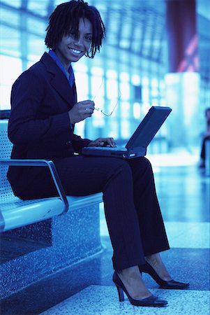 simsearch:700-00071171,k - Portrait of Businesswoman with Laptop in Terminal Stock Photo - Rights-Managed, Code: 700-00071157