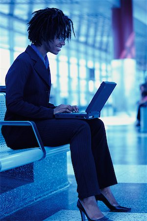 simsearch:700-00071171,k - Businesswoman Using Laptop in Terminal Stock Photo - Rights-Managed, Code: 700-00071158