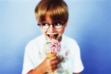 Boy Eating Ice Cream Cone Stock Photo - Rights-Managed, Code: 700-00071242