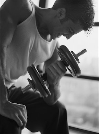 fitness black and white - Man Lifting Weights Foto de stock - Con derechos protegidos, Código: 700-00071479