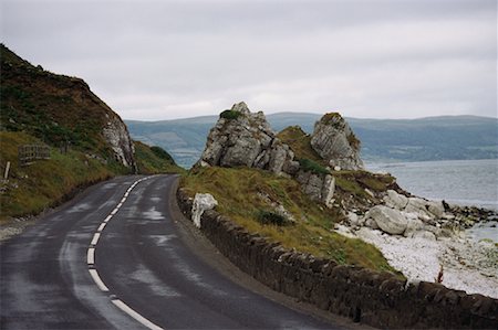 Coast Road and Rocks on Landscape Near Shore, County Antrim Northern Ireland Fotografie stock - Rights-Managed, Codice: 700-00071649