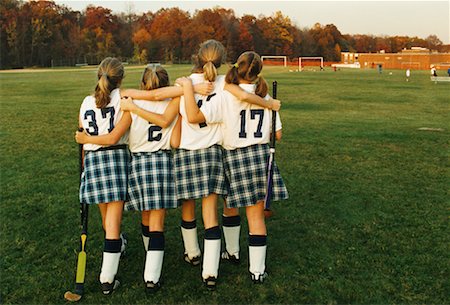 field hockey - Back View of Young Female Field Hockey Players Walking in Field Stock Photo - Rights-Managed, Code: 700-00071662