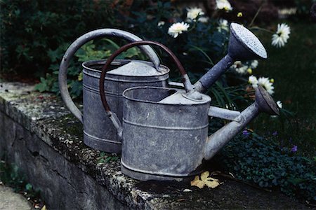 Watering Cans in Garden Stock Photo - Rights-Managed, Code: 700-00072021