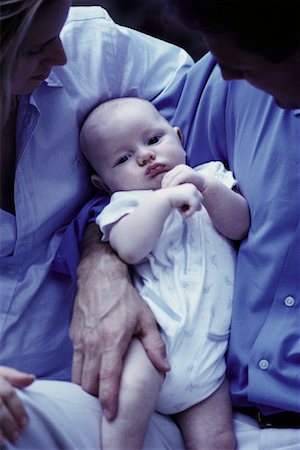 simsearch:700-00074987,k - Close-Up of Mother and Father Holding Baby Stock Photo - Rights-Managed, Code: 700-00072428