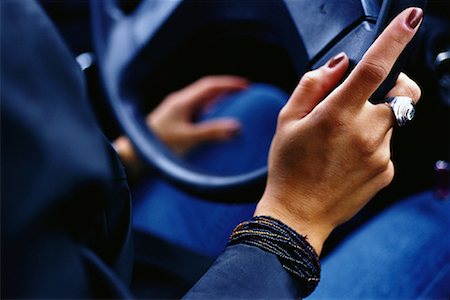 Close-Up of Woman's Hands on Steering Wheel Stock Photo - Rights-Managed, Code: 700-00072632