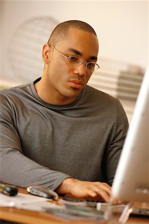Man Using Computer Foto de stock - Con derechos protegidos, Código: 700-00072745