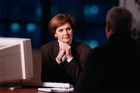 female banker (owner or executive) - Mature Businesswoman Sitting at Desk with Mature Man Stock Photo - Rights-Managed, Code: 700-00072777