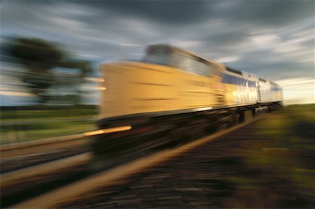 simsearch:600-00174108,k - Blurred View of Speeding Train At Sunset Stock Photo - Rights-Managed, Code: 700-00073102