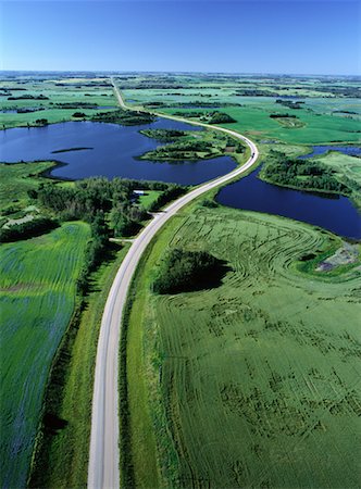 Vue aérienne des cultures de plein champ et Road, Sandy Lake, Manitoba Canada Photographie de stock - Rights-Managed, Code: 700-00073178