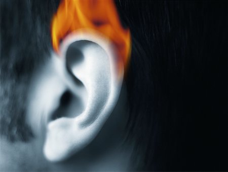 ears on fire images - Close-Up of Burning Ear Stock Photo - Rights-Managed, Code: 700-00073298