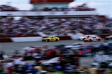 Blurred View of Race Cars and Crowd Stock Photo - Rights-Managed, Code: 700-00073519