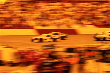 Blurred View of Race Cars and Crowd Stock Photo - Rights-Managed, Code: 700-00073530