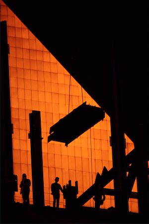 Silhouette de Construction au coucher du soleil Photographie de stock - Rights-Managed, Code: 700-00073747