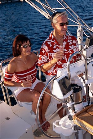 Mature Couple on Boat, Holding Glasses of Champagne Stock Photo - Rights-Managed, Code: 700-00073948