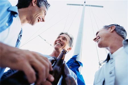 friends sailing - Three Mature Men Drinking Beer On Boat Stock Photo - Rights-Managed, Code: 700-00084182