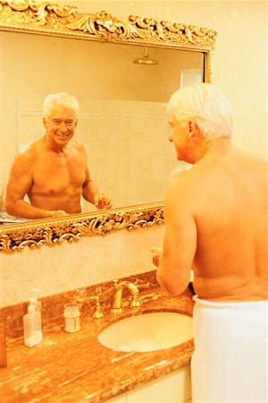 simsearch:700-00199902,k - Mature Man Wrapped in Towel in Bathroom, Looking at Reflection In Mirror Stock Photo - Rights-Managed, Code: 700-00084230